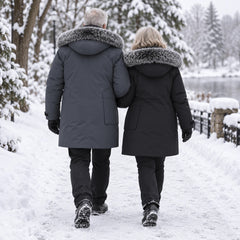Arctic Shield Parka in grey and black, couple walking in the snow
