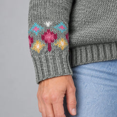 Close-up of the patterned sleeve and ribbed cuff