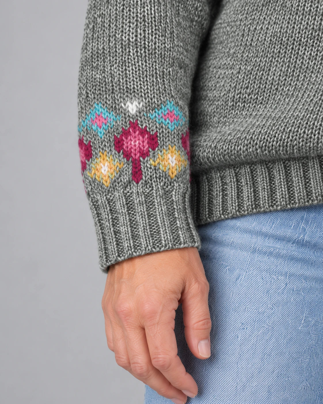 Close-up of the patterned sleeve and ribbed cuff