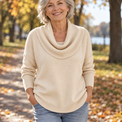 Julia draped cowl neck sweater in beige, worn on an autumn walk